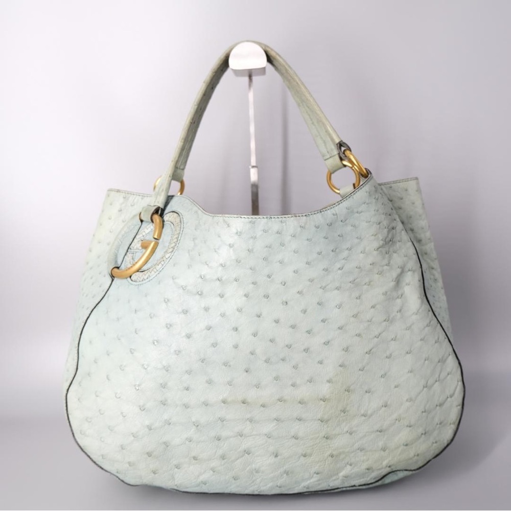 This authentic Gucci Splash Bag in Ostrich leather.